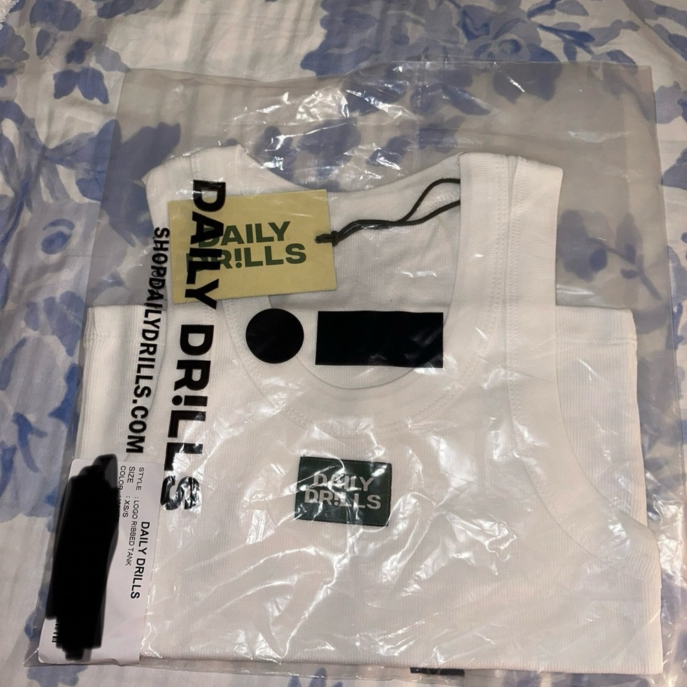 Daily Drills logo tank!! Never opened!!